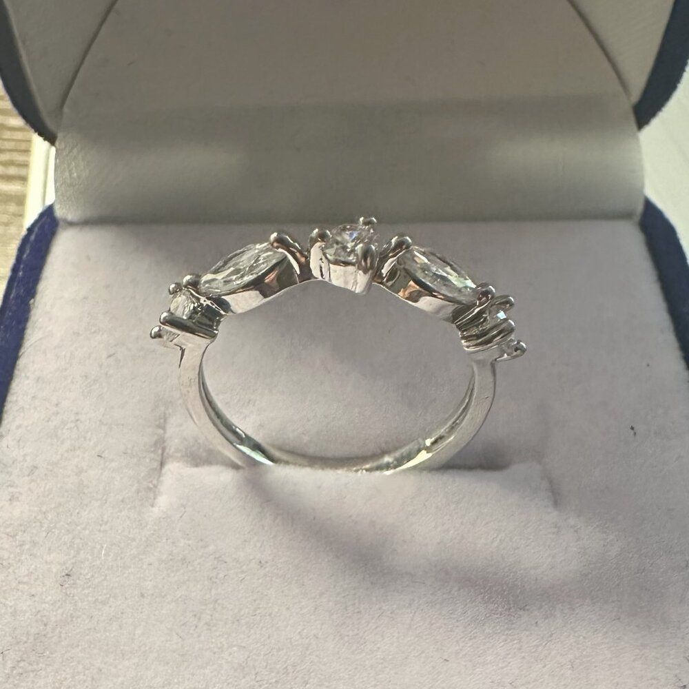 sterling silver with 2 Pears, 3 round Cubic Zirconia Band, size 6, brand new.